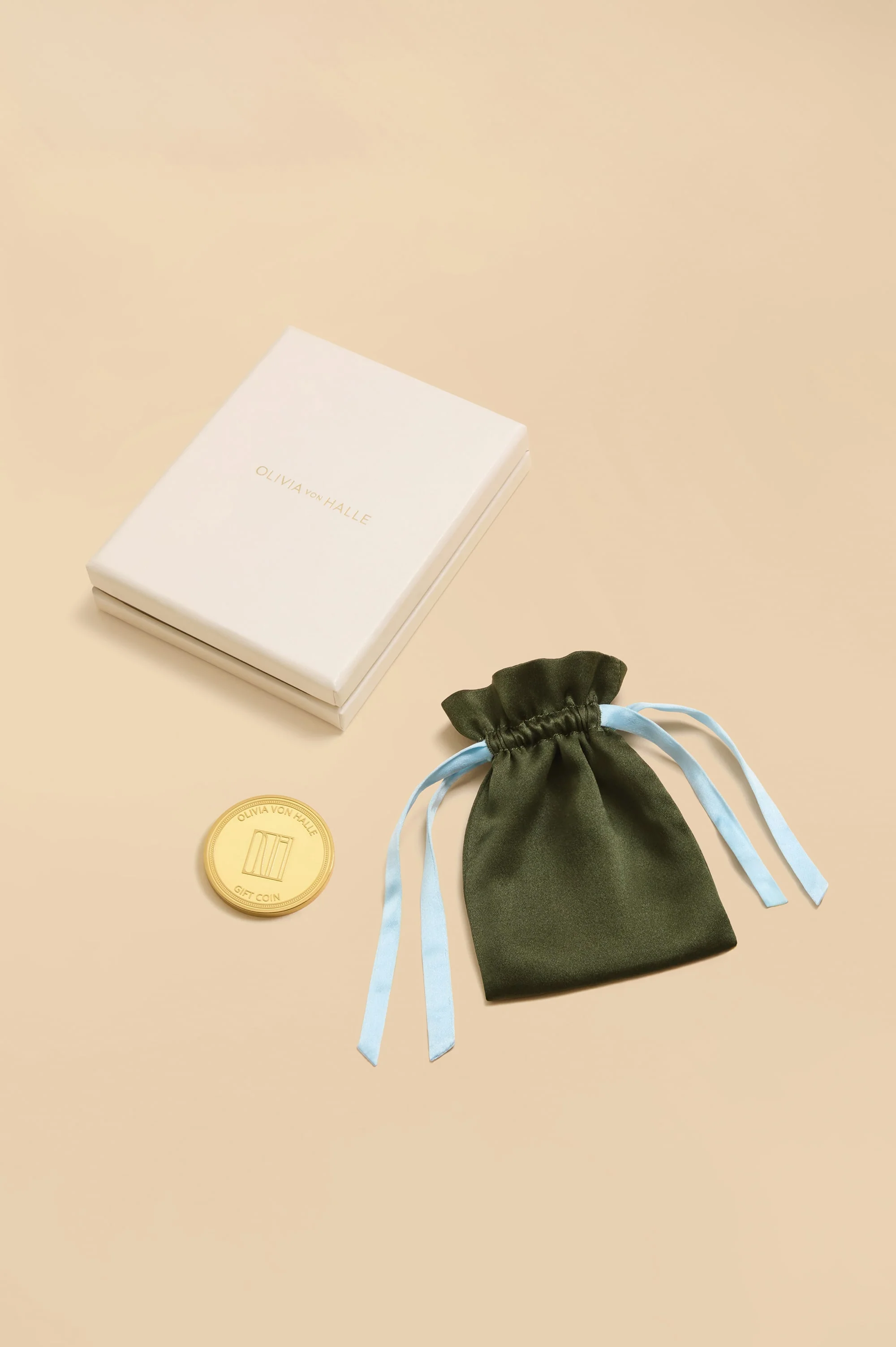 Olivia von Halle Gift Coin